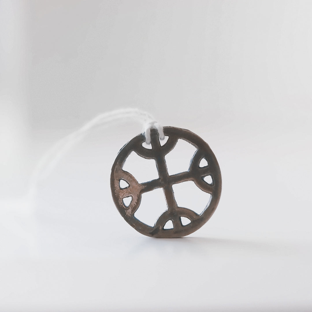 Sun Wheel Amulet